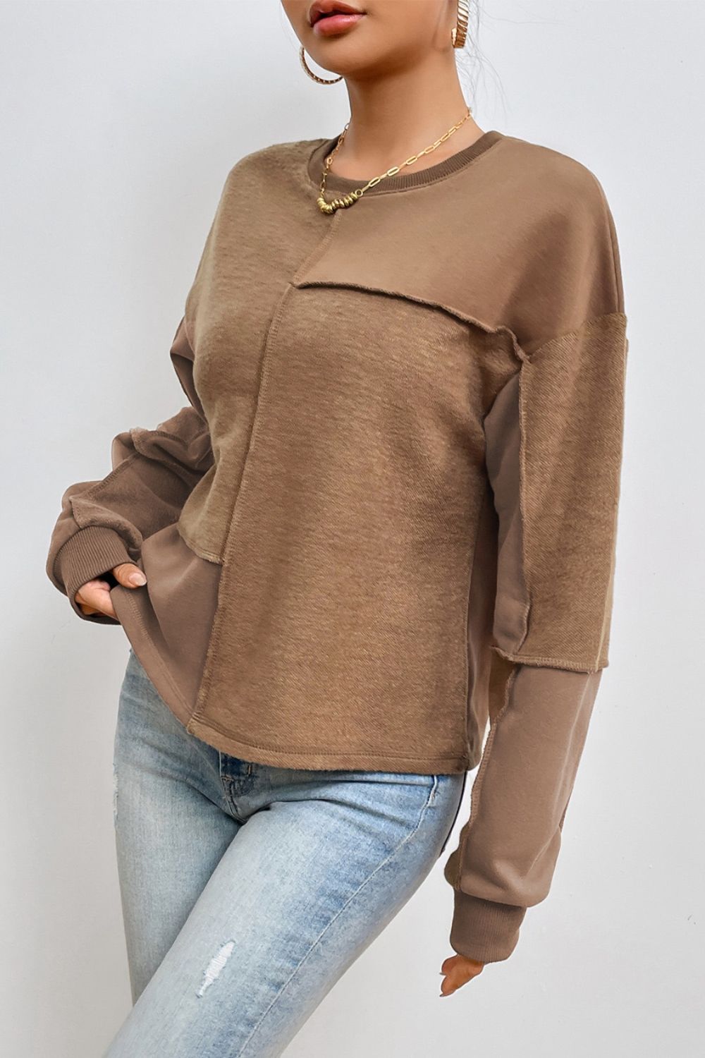 Exposed Seam Round Neck Long Sleeve Sweatshirt